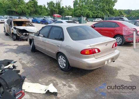 1999 Toyota Corolla Le from USA, damaged, VIN 2T1BR12E4XC255182